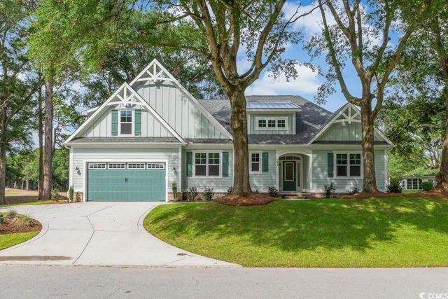 $694,500 | 394 Sea Trail Drive West, Sunset Beach, NC 28468