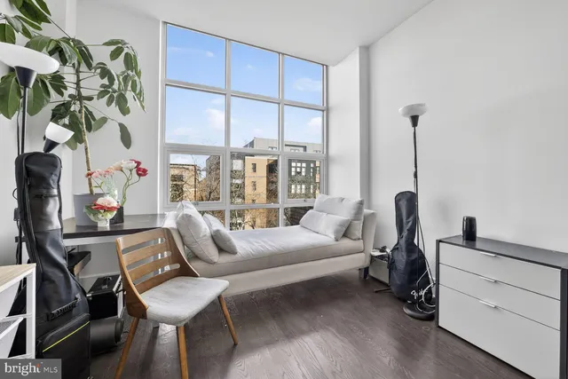 a room with furniture and a window