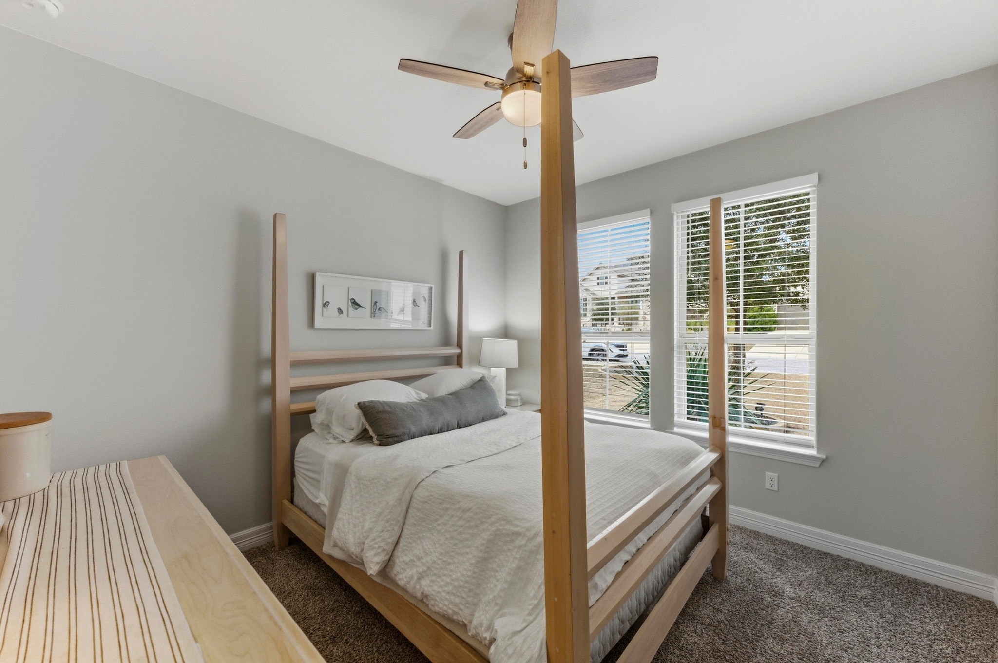 348 Panzano Drive Georgetown, TX 78628 - Photo 20 of 35 a bedroom with a bed and wooden floor