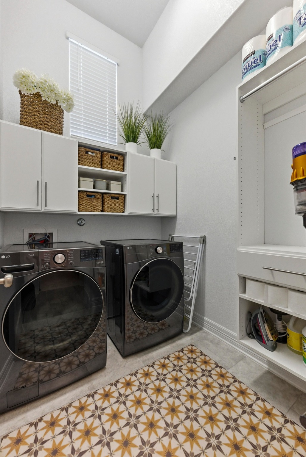 348 Panzano Drive Georgetown, TX 78628 - Photo 22 of 35 a kitchen with a sink a stove and cabinets