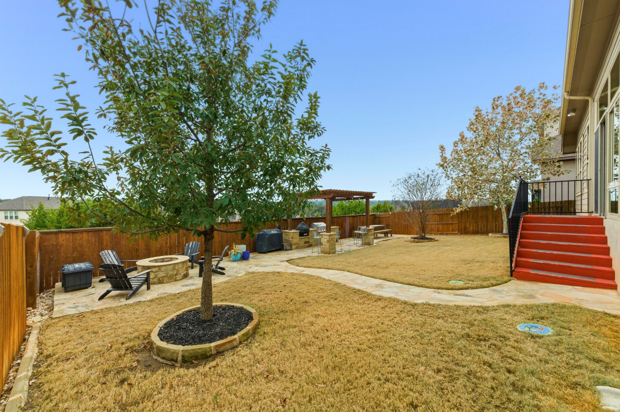 348 Panzano Drive Georgetown, TX 78628 - Photo 29 of 35 a swimming pool with a yard and in the back