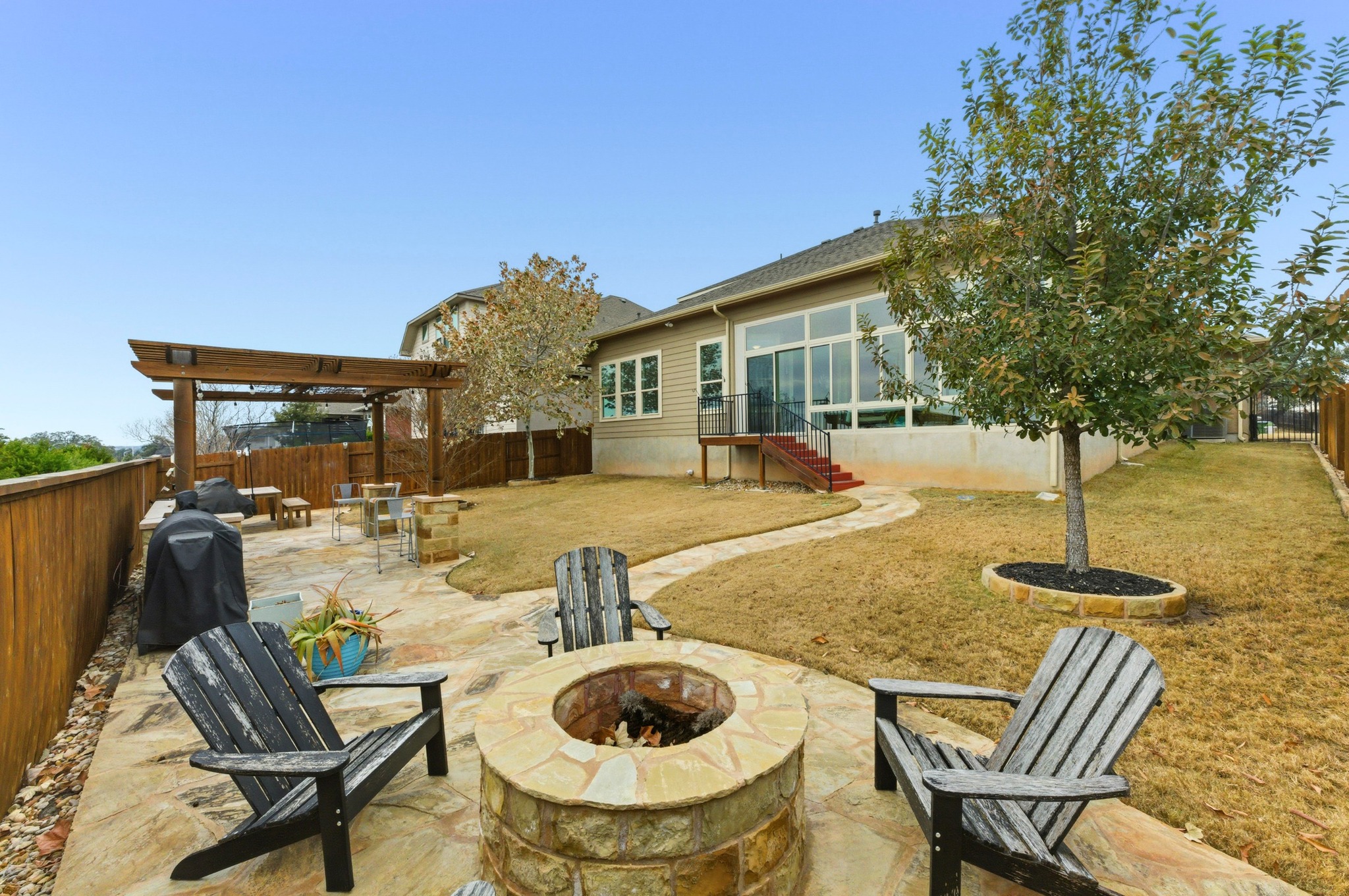 348 Panzano Drive Georgetown, TX 78628 - Photo 8 of 35 a front view of a house with swimming pool and furniture