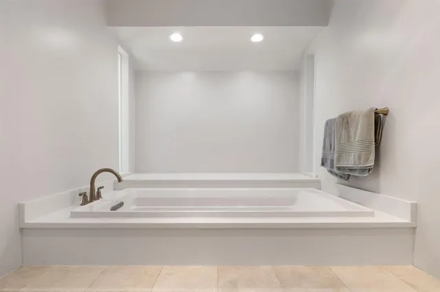 a bathroom with a bathtub