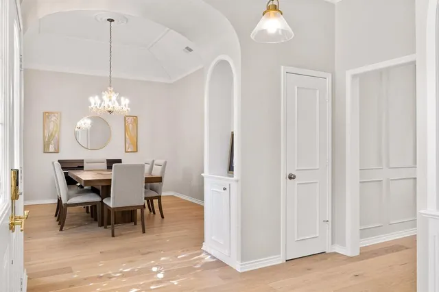 a view of a dining room and chairs