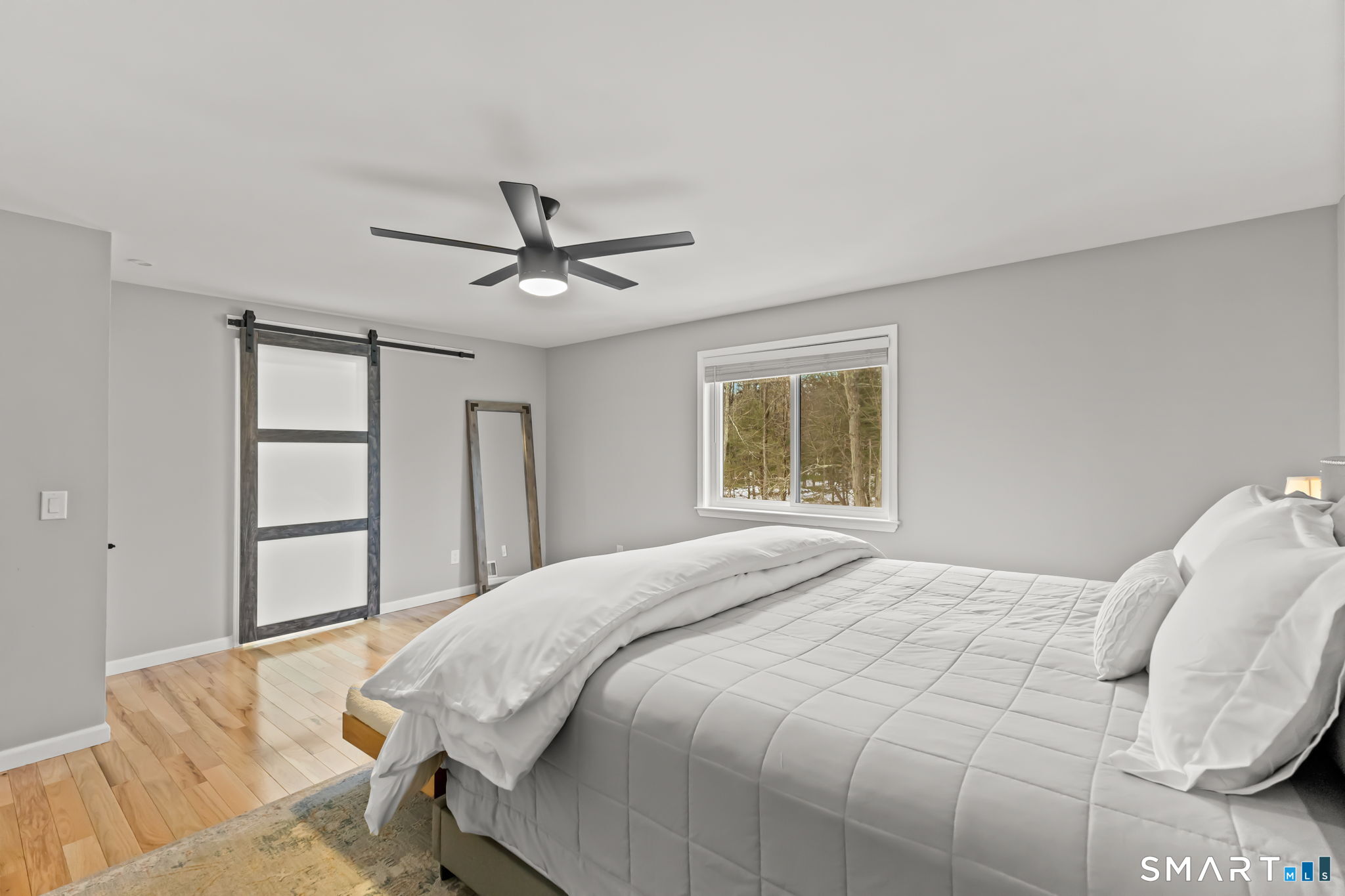 299 Redding Road Redding, CT 06896 - Photo 15 of 38 a bedroom with a bed and a window