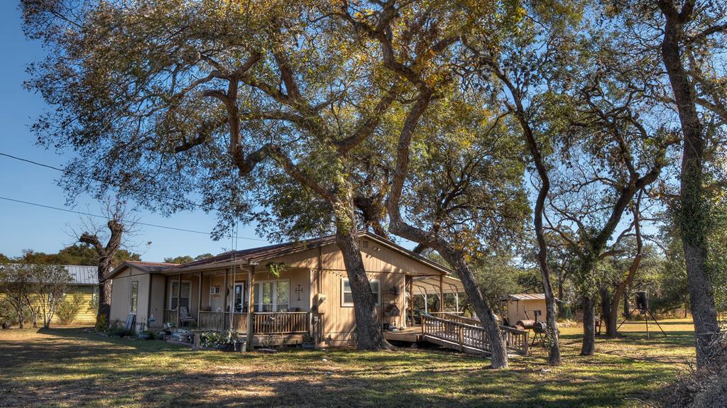 218 Trickling Creek Road Rio Frio, TX 78879 - Photo 2 of 39 a view of a town with large trees