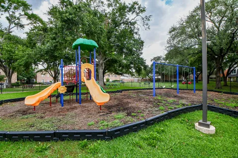 a view of a park with slide