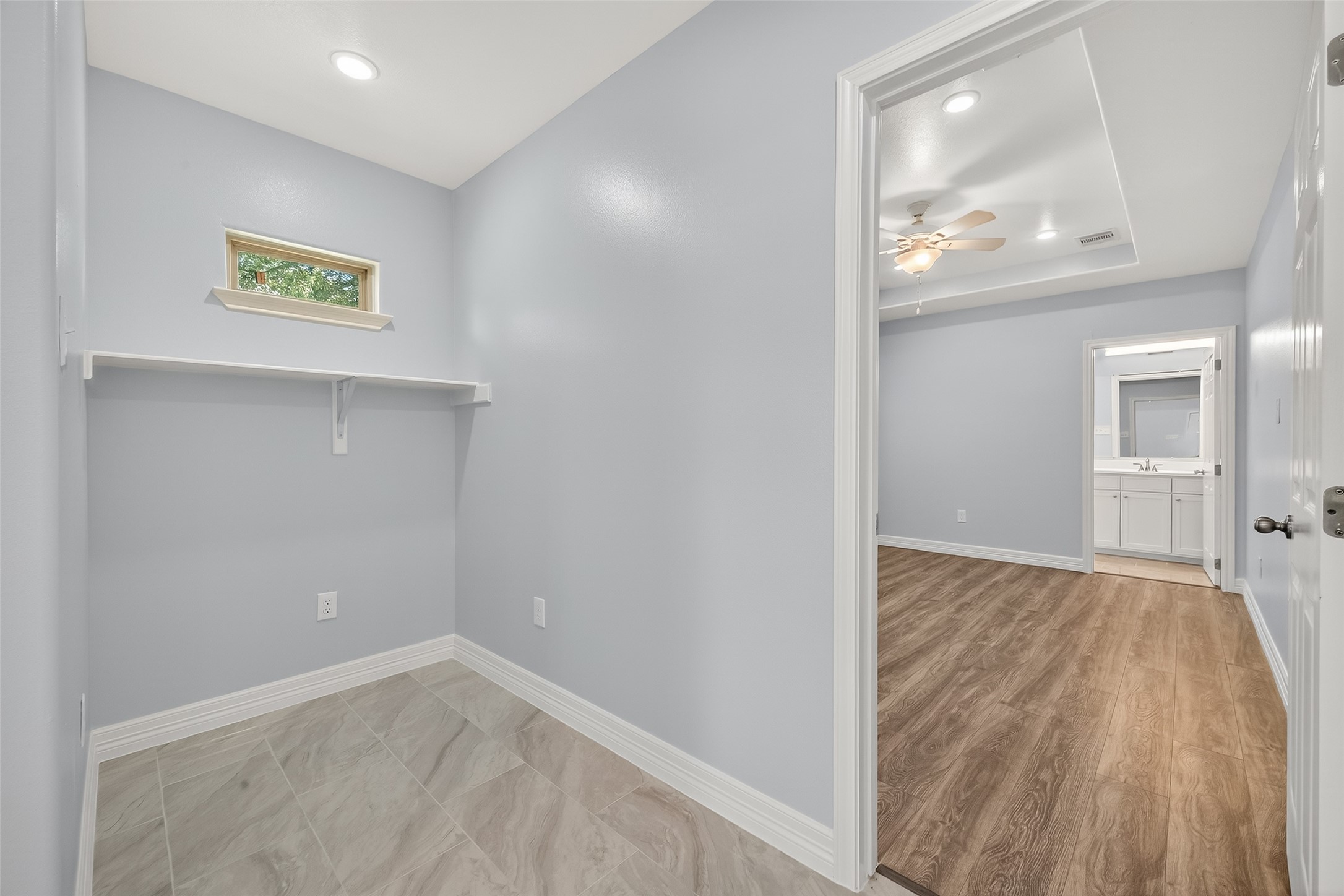 6928 Apache Street Houston, TX 77028 - Photo 20 of 40 a view of empty room with wooden floor