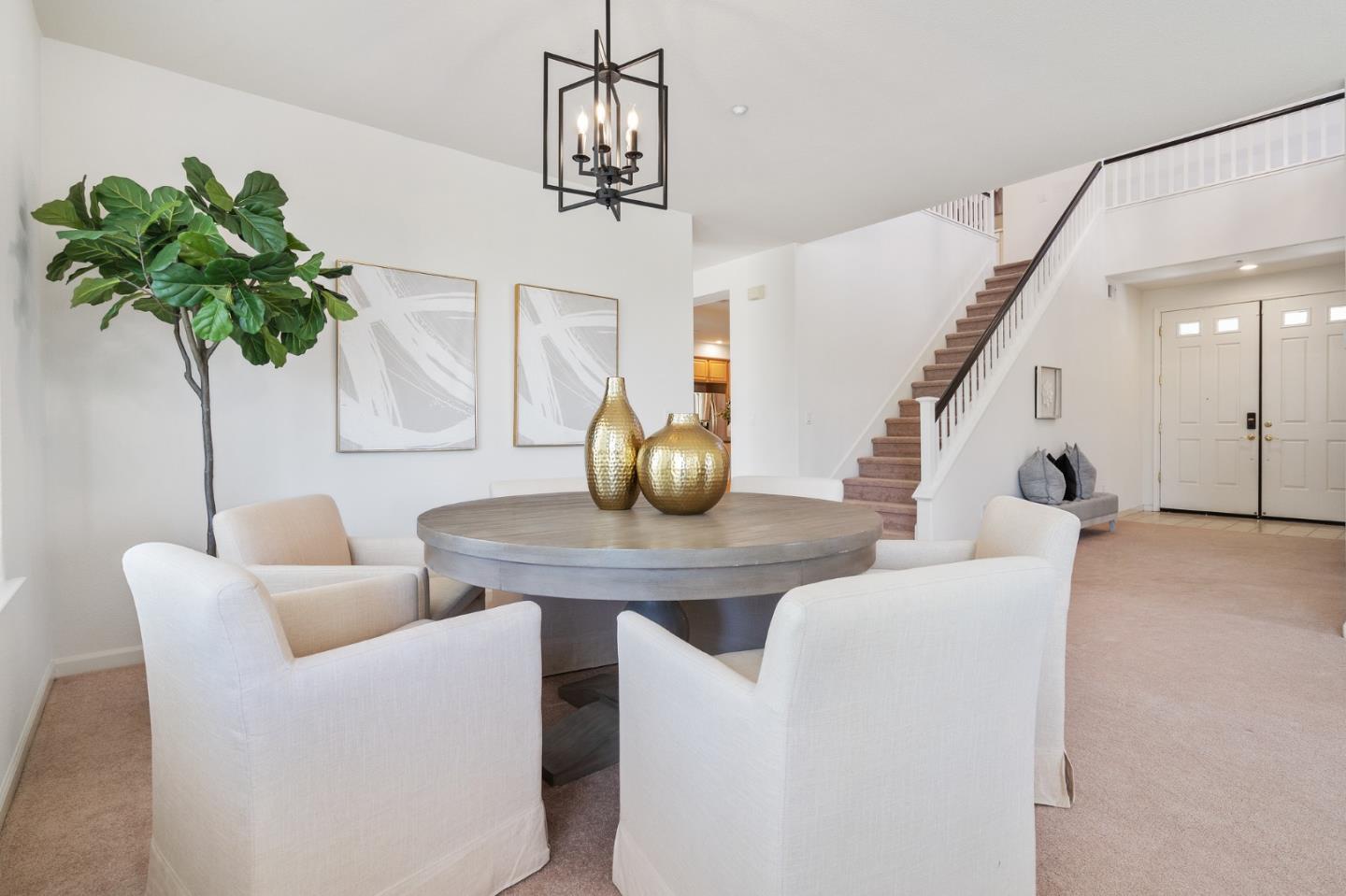 357 Pebble Beach Drive Brentwood, CA 94513 - Photo 11 of 56 a living room with furniture and a potted plant