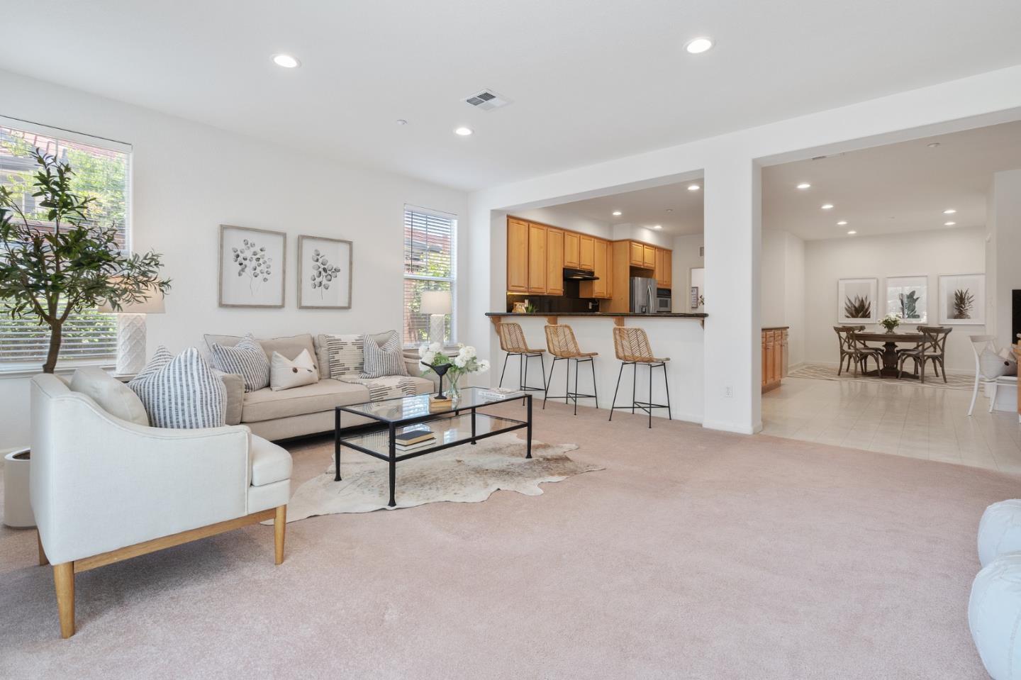 357 Pebble Beach Drive Brentwood, CA 94513 - Photo 15 of 56 a living room with furniture and a flat screen tv