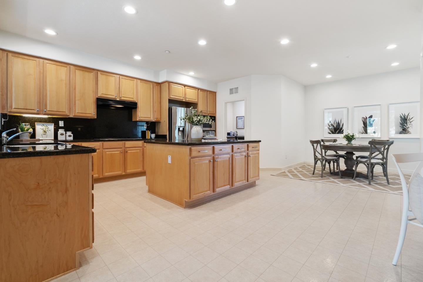 357 Pebble Beach Drive Brentwood, CA 94513 - Photo 19 of 56 a kitchen with stainless steel appliances a sink a counter top space cabinets and a window