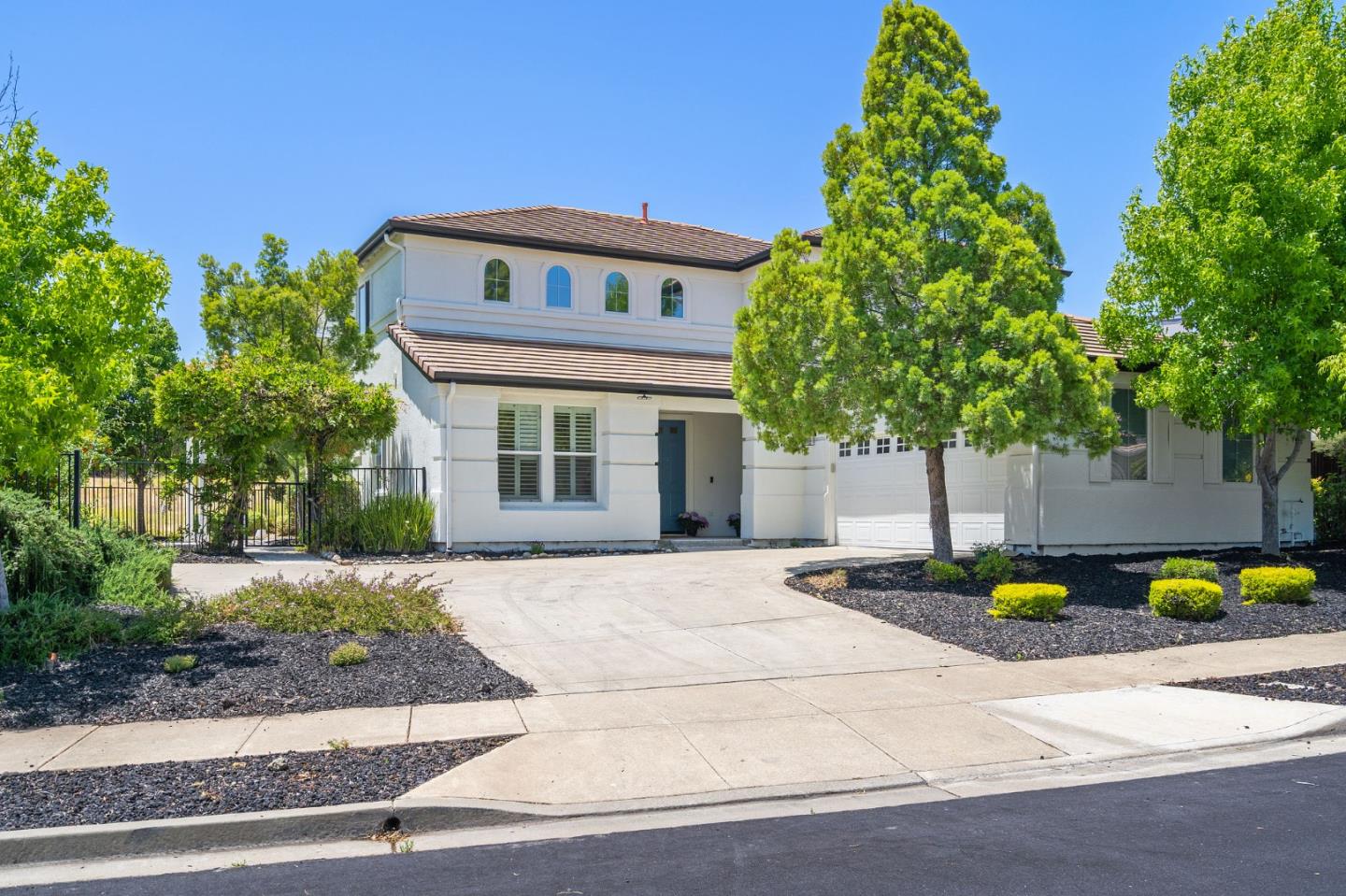 357 Pebble Beach Drive Brentwood, CA 94513 - Photo 2 of 56 front view of a house with potted plants