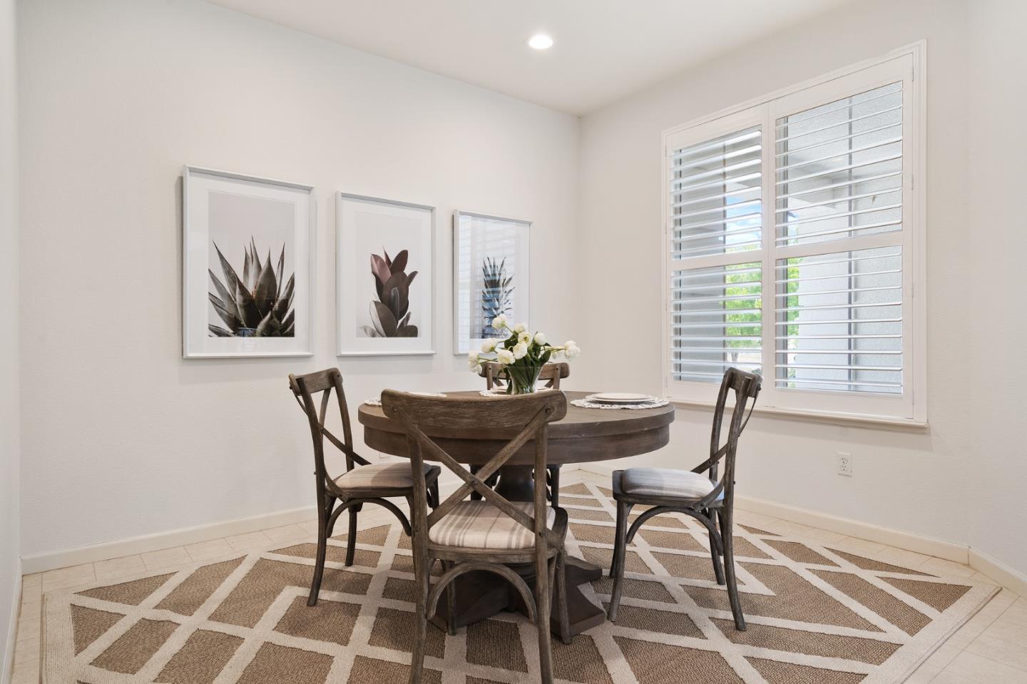 357 Pebble Beach Drive Brentwood, CA 94513 - Photo 24 of 56 a view of a dining room with furniture and a window