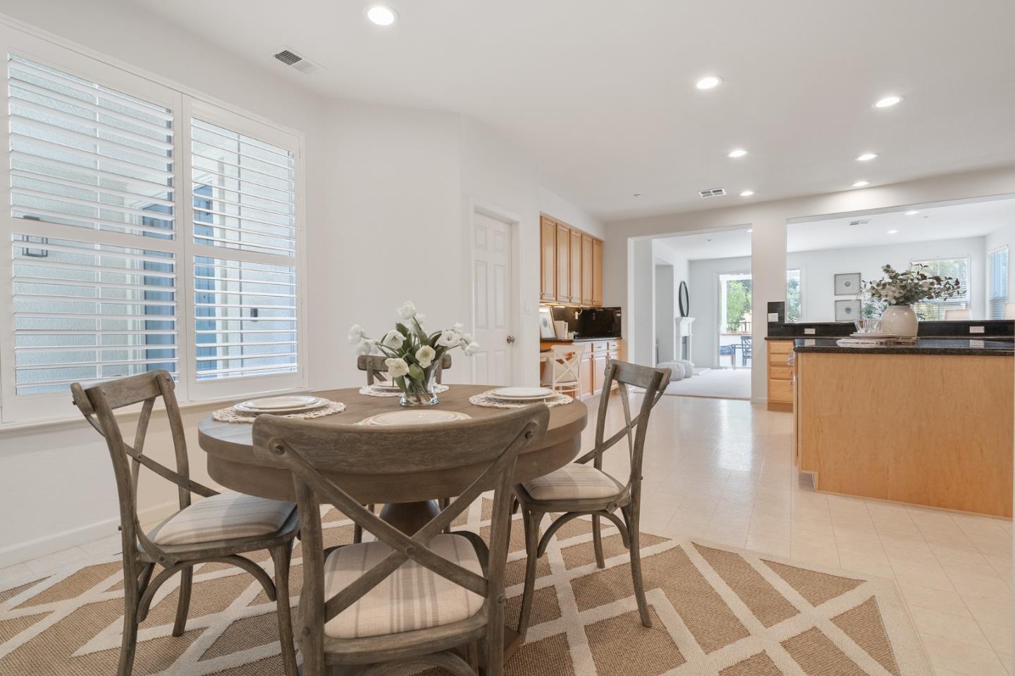 357 Pebble Beach Drive Brentwood, CA 94513 - Photo 25 of 56 a view of a dining room with furniture and wooden floor