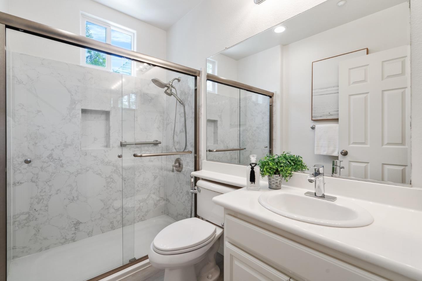 357 Pebble Beach Drive Brentwood, CA 94513 - Photo 31 of 56 a bathroom with a sink toilet and shower