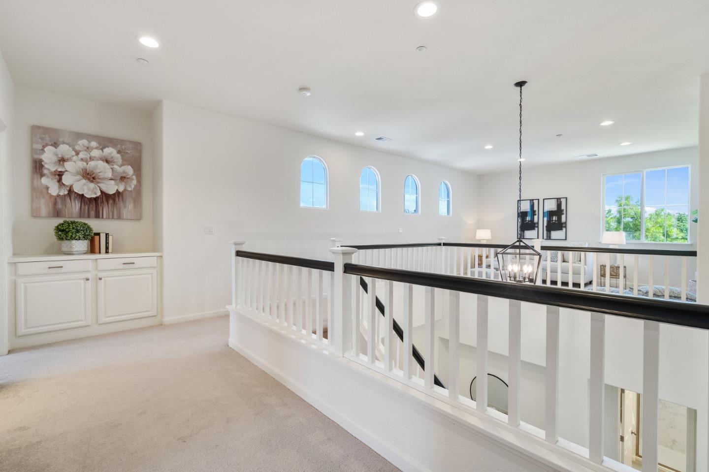 357 Pebble Beach Drive Brentwood, CA 94513 - Photo 32 of 56 a view of hallway with chandelier