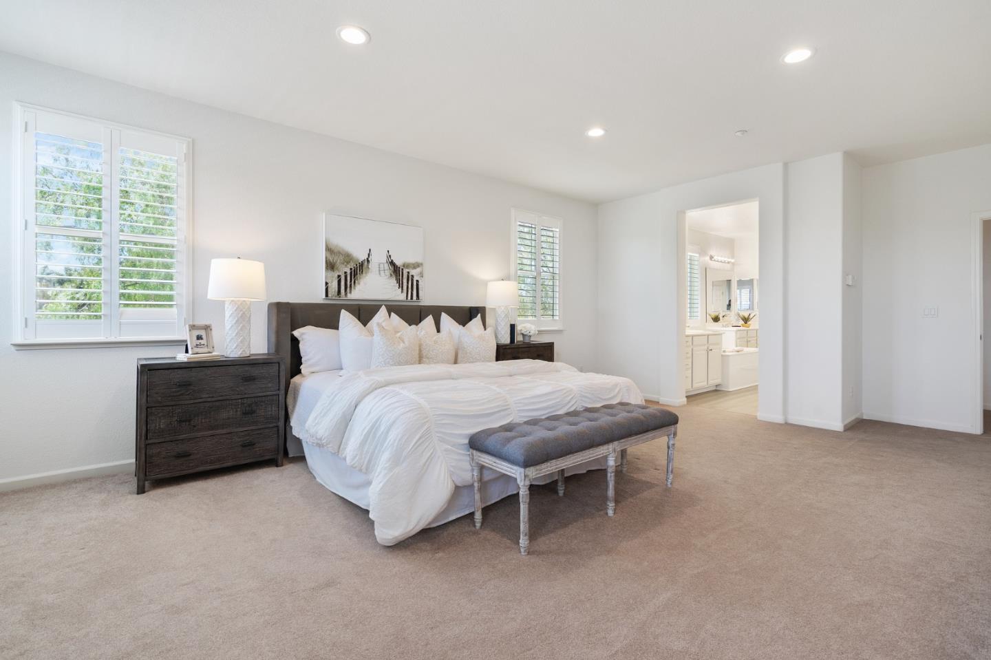 357 Pebble Beach Drive Brentwood, CA 94513 - Photo 37 of 56 a spacious bedroom with a bed and a window