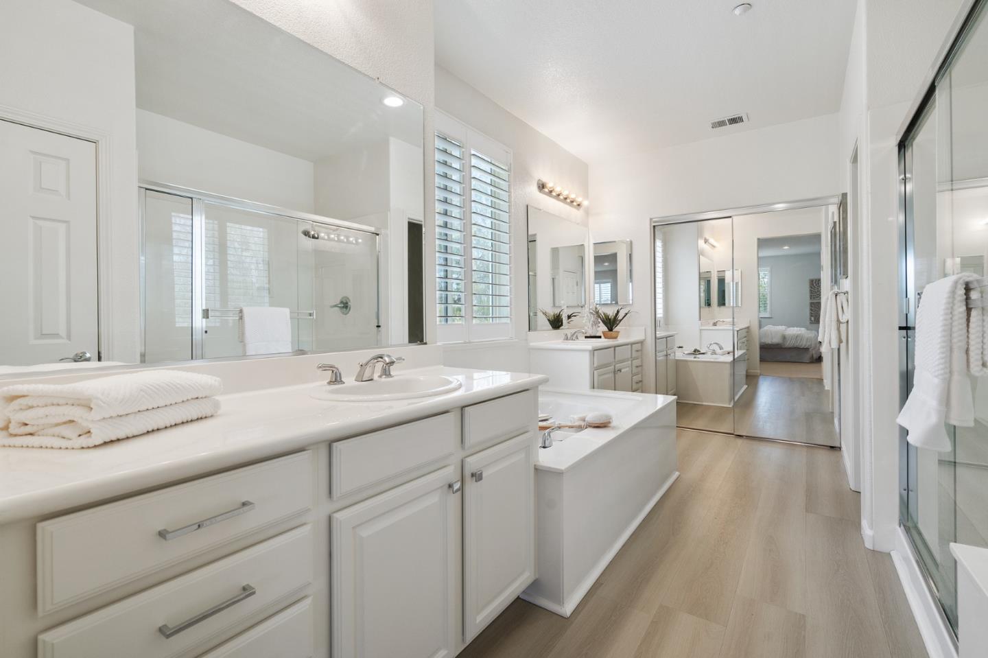 357 Pebble Beach Drive Brentwood, CA 94513 - Photo 39 of 56 a spacious bathroom with a double vanity sink a mirror and a shower