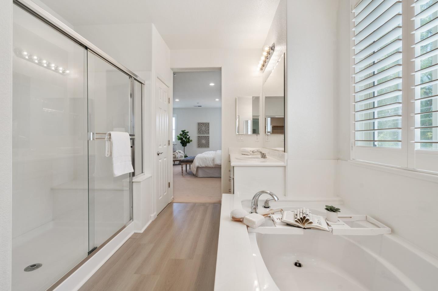 357 Pebble Beach Drive Brentwood, CA 94513 - Photo 40 of 56 a bathroom with a tub sink and mirror
