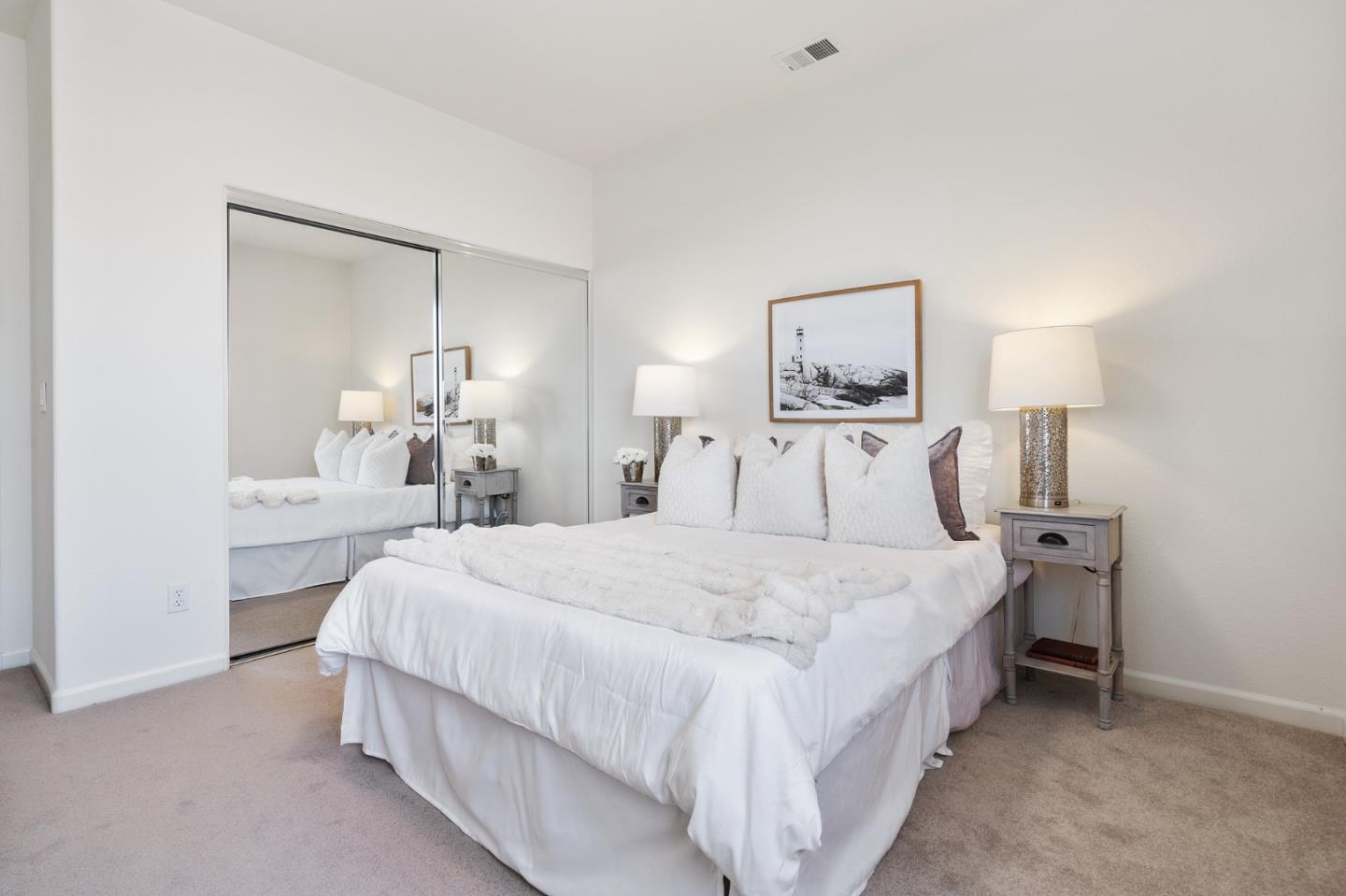 357 Pebble Beach Drive Brentwood, CA 94513 - Photo 44 of 56 a bedroom with a bed and a lamp