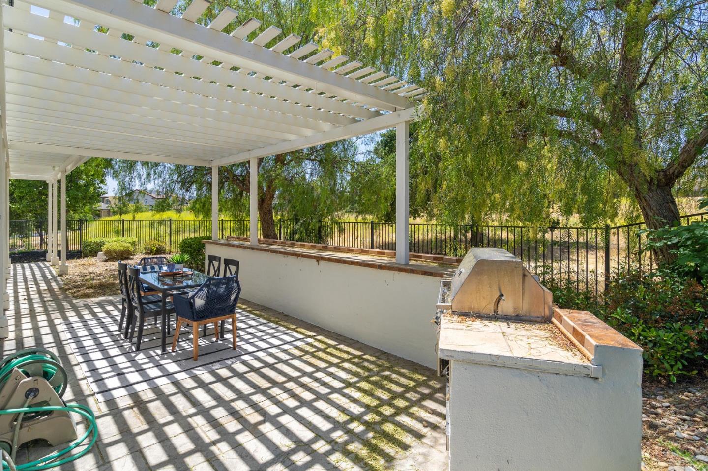 357 Pebble Beach Drive Brentwood, CA 94513 - Photo 54 of 56 a view of a patio with a table chairs and backyard