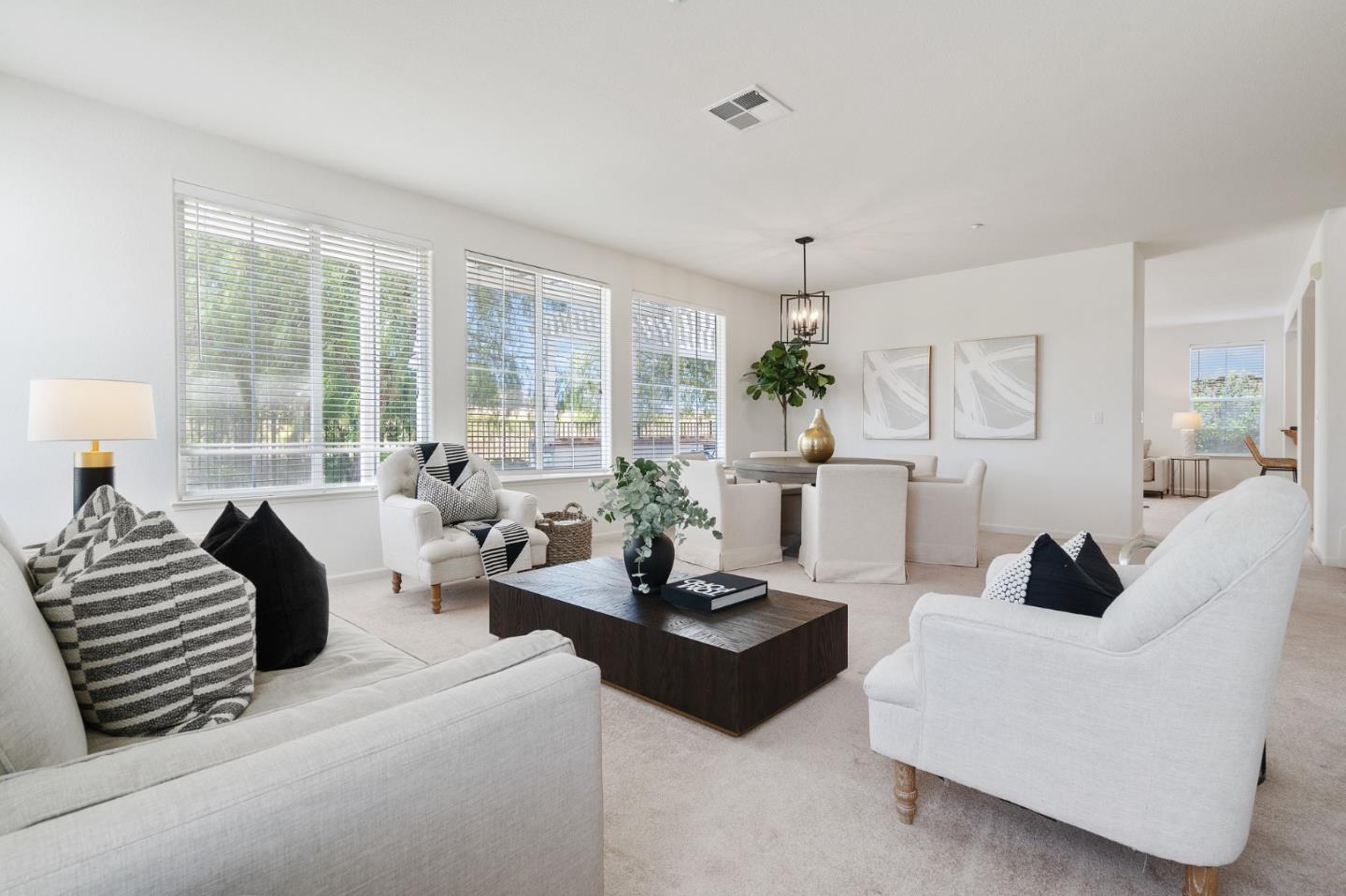 357 Pebble Beach Drive Brentwood, CA 94513 - Photo 9 of 56 a living room with furniture and a large window