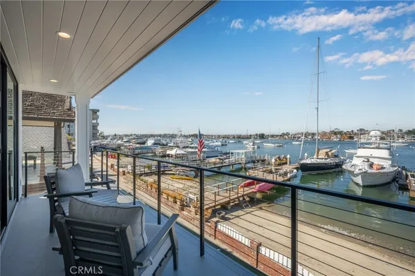 a view of a balcony with wooden floor