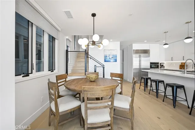 a kitchen with a sink and a microwave