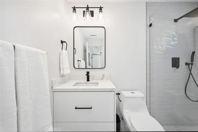 a kitchen with cabinets and window