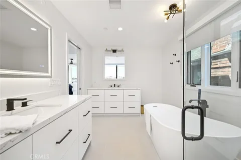 a bed room with a bed and a fireplace