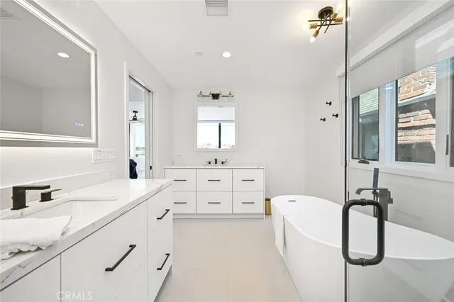 a bed room with a bed and a fireplace