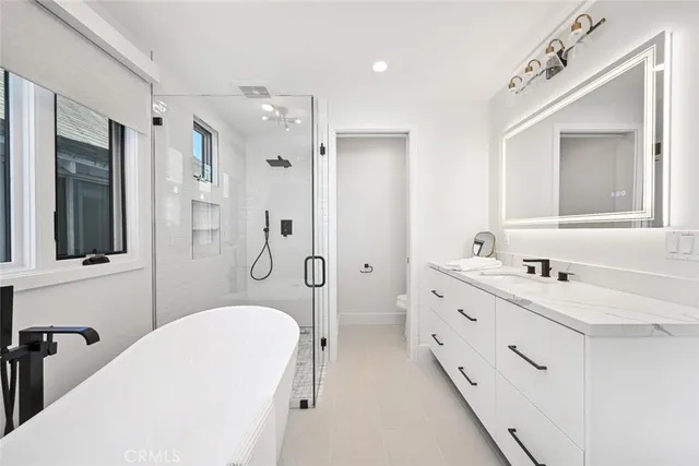 a bed room with furniture and wooden floor