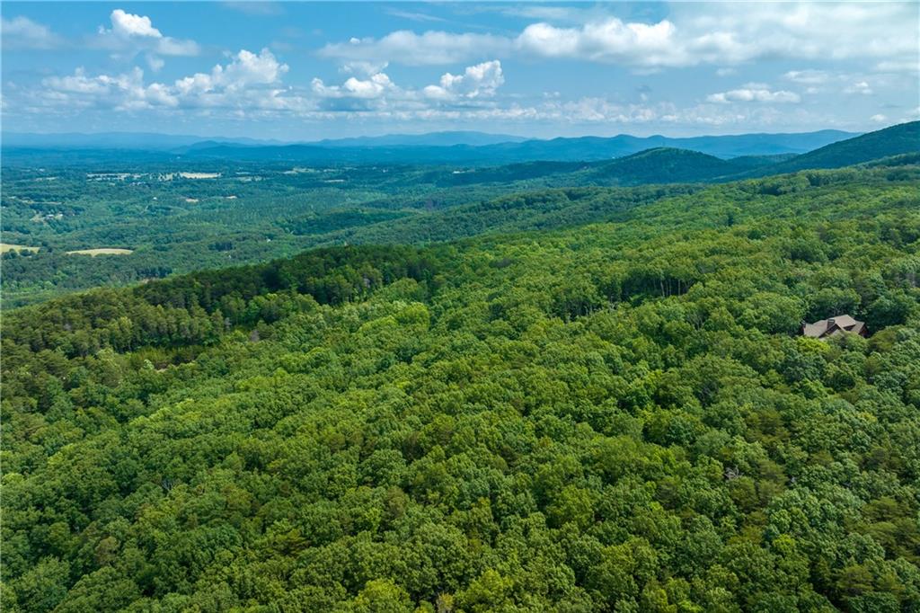 206 R Mystic Trail Lane Jasper, GA 30143 - Photo 26 of 38 a view of a big yard with lots of green space and mountain view