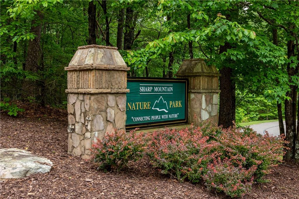 206 R Mystic Trail Lane Jasper, GA 30143 - Photo 29 of 38 a street sign that is sitting in the middle of a yard