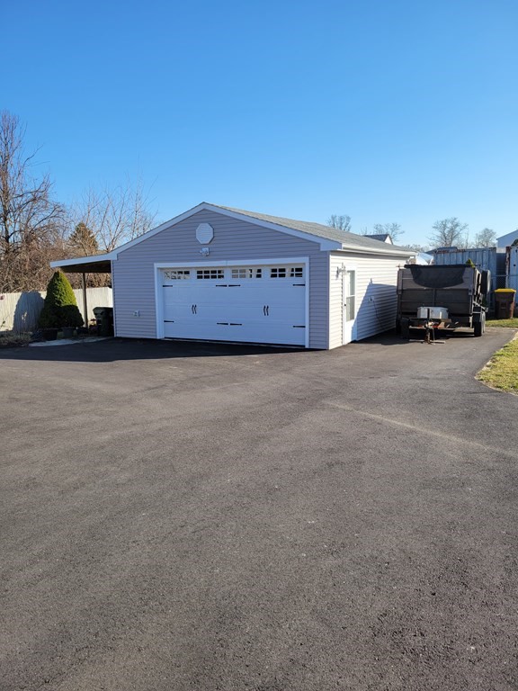 591 Chicago Street Fall River, MA 02721 - Photo 3 of 26 a view of a car garage
