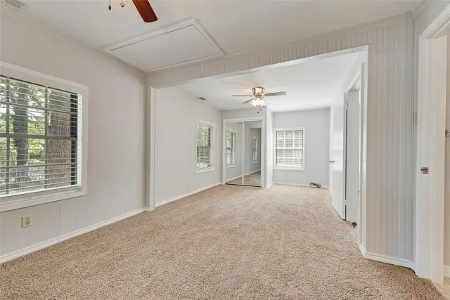 a bathroom with a sink a mirror and a shower