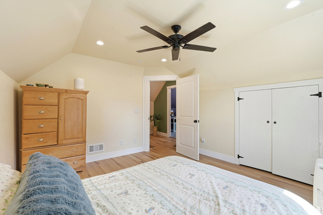210 North 200 West Logan, UT 84321 - Photo 20 of 31 Bedroom featuring wood-finish flooring, recessed lighting, and a ceiling fan