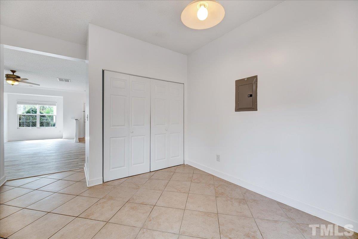 3367 Bridgeville Road Raleigh, NC 27610 - Photo 15 of 34 an empty room with windows