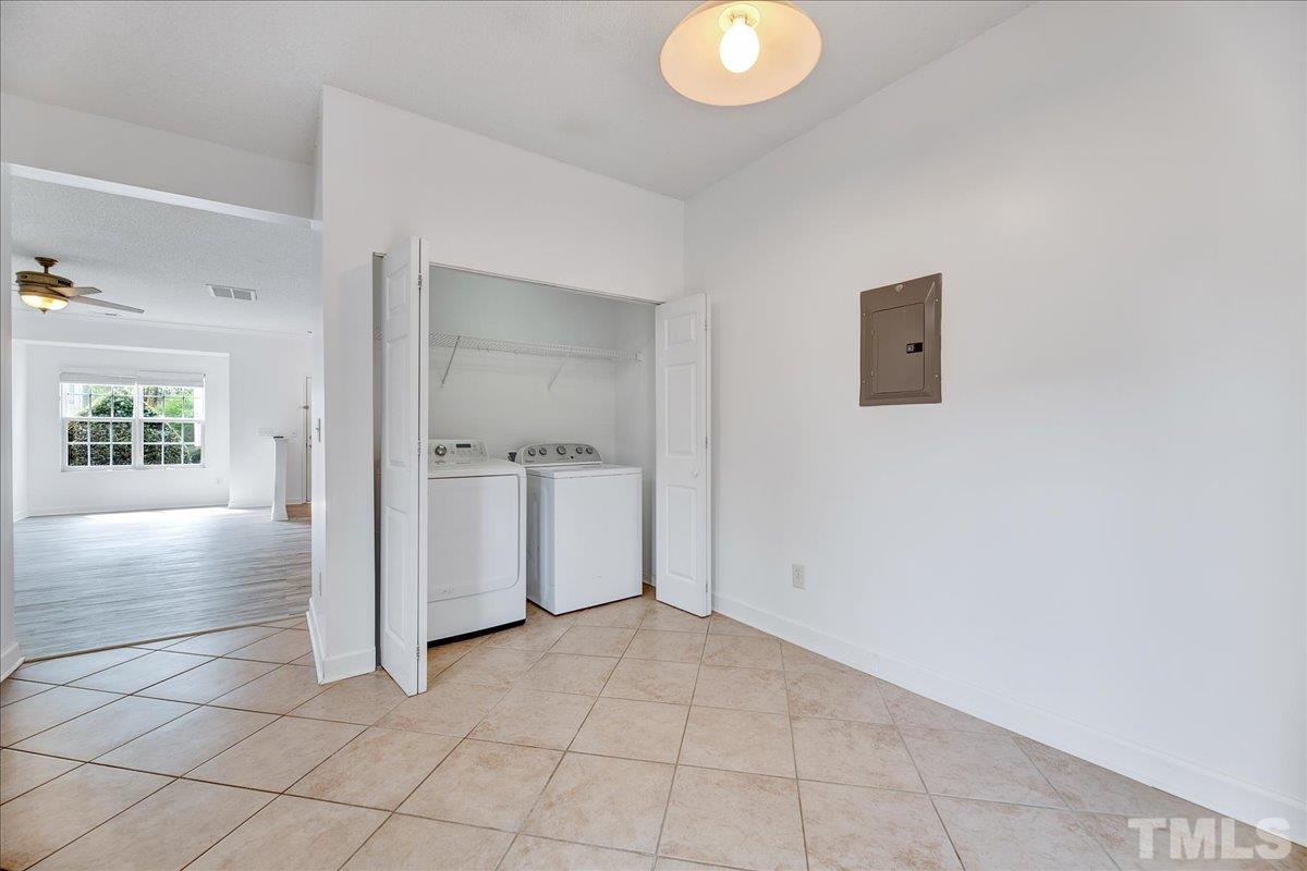 3367 Bridgeville Road Raleigh, NC 27610 - Photo 16 of 34 an empty room with windows and entrance