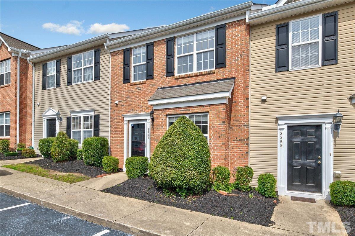 3367 Bridgeville Road Raleigh, NC 27610 - Photo 2 of 34 a front view of a house with garden
