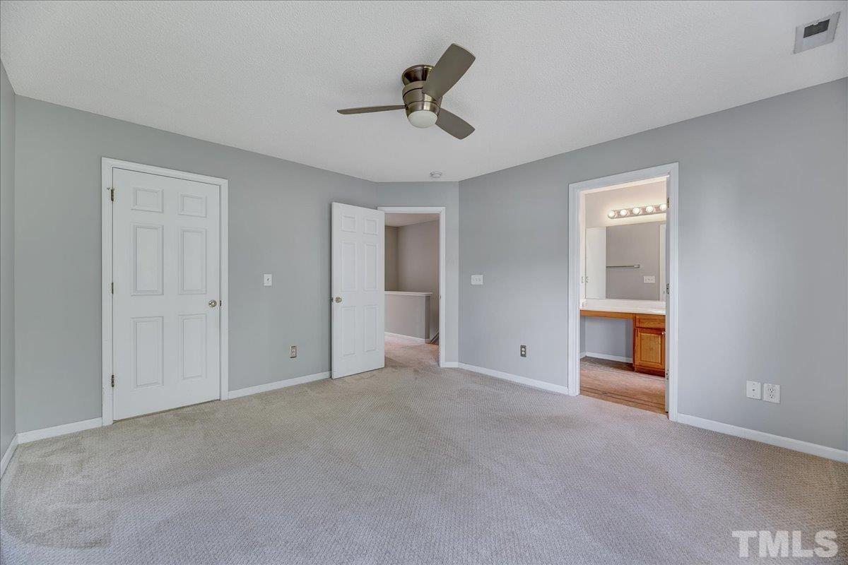 3367 Bridgeville Road Raleigh, NC 27610 - Photo 27 of 34 a view of empty room with ceiling fan