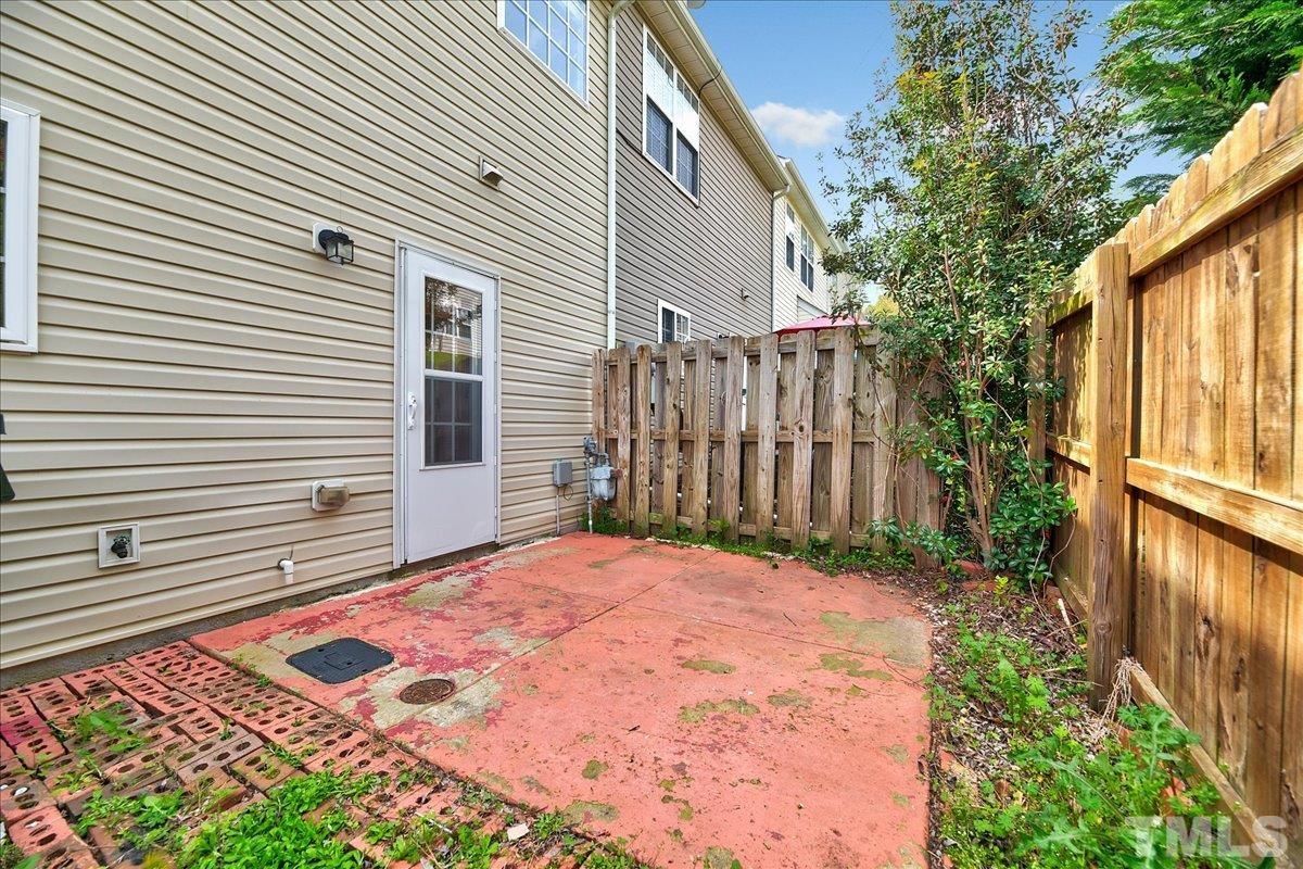 3367 Bridgeville Road Raleigh, NC 27610 - Photo 32 of 34 a backyard of a house