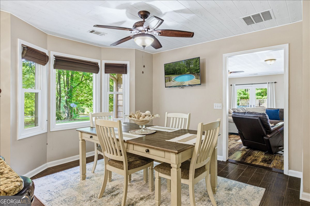 265 Floyd Road Hampton, GA 30228 - Photo 15 of 64 a view of a dining room with furniture window and outside view