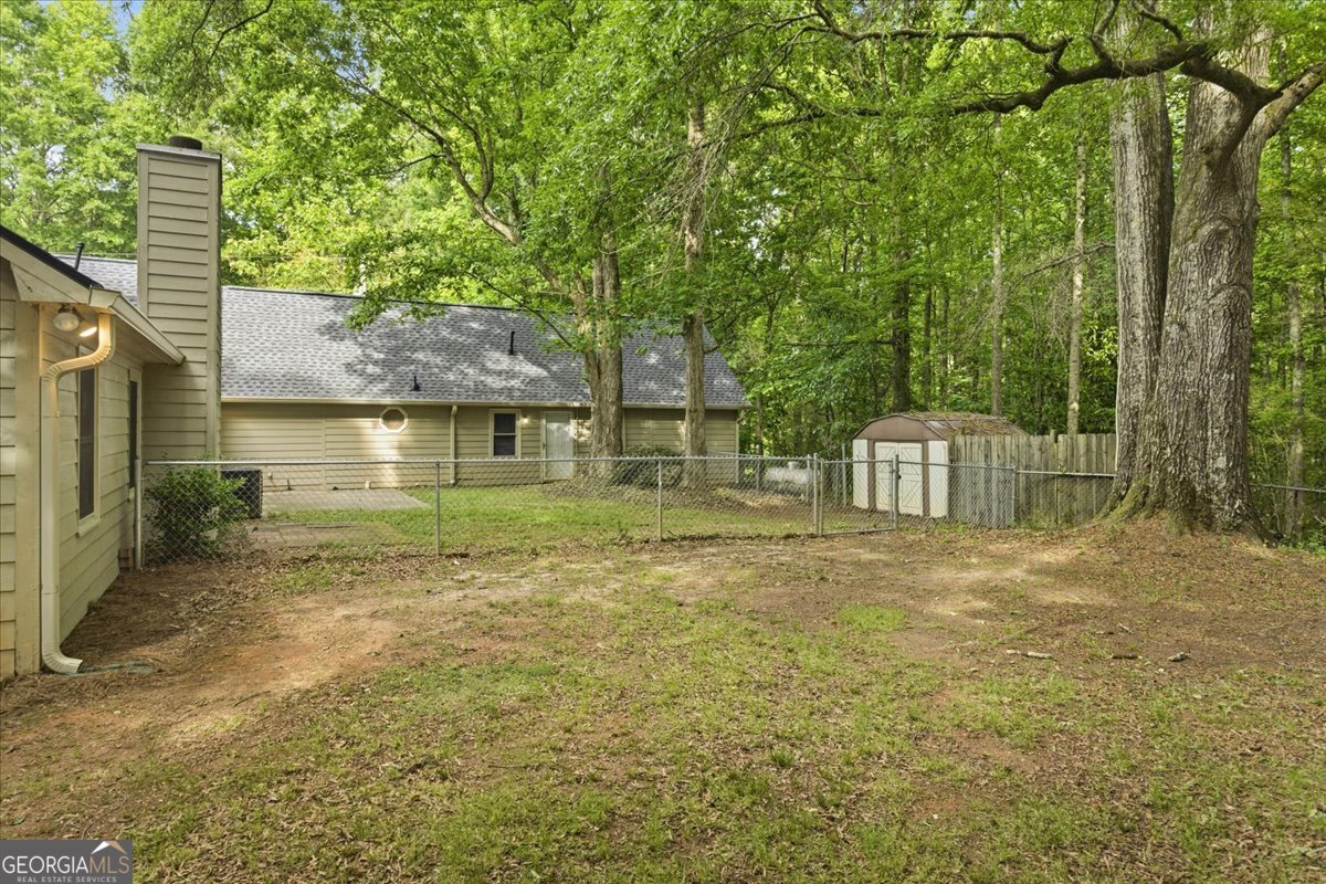 265 Floyd Road Hampton, GA 30228 - Photo 45 of 64 a front view of a house with a yard