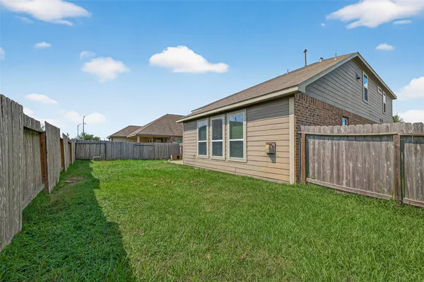 a view of a backyard with a garden