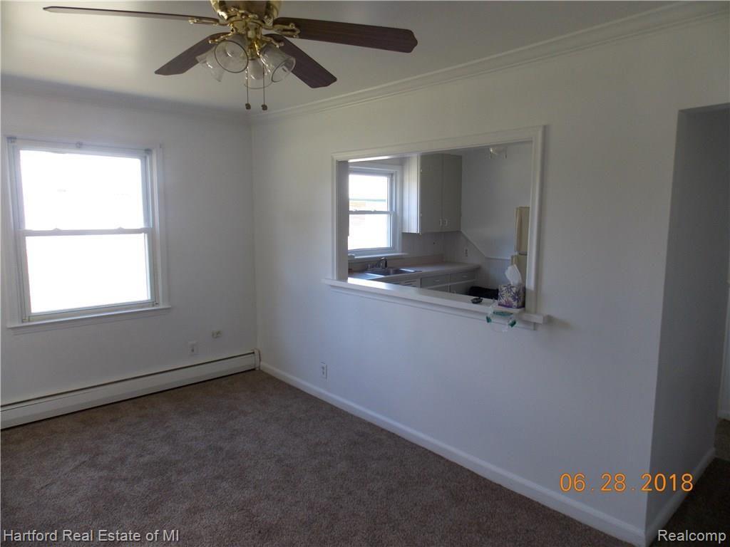 21830 Power Road Farmington, MI 48336 - Photo 4 of 17 Pass through to kitchen