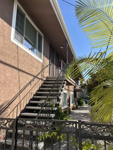 a view of street along with wooden stairs