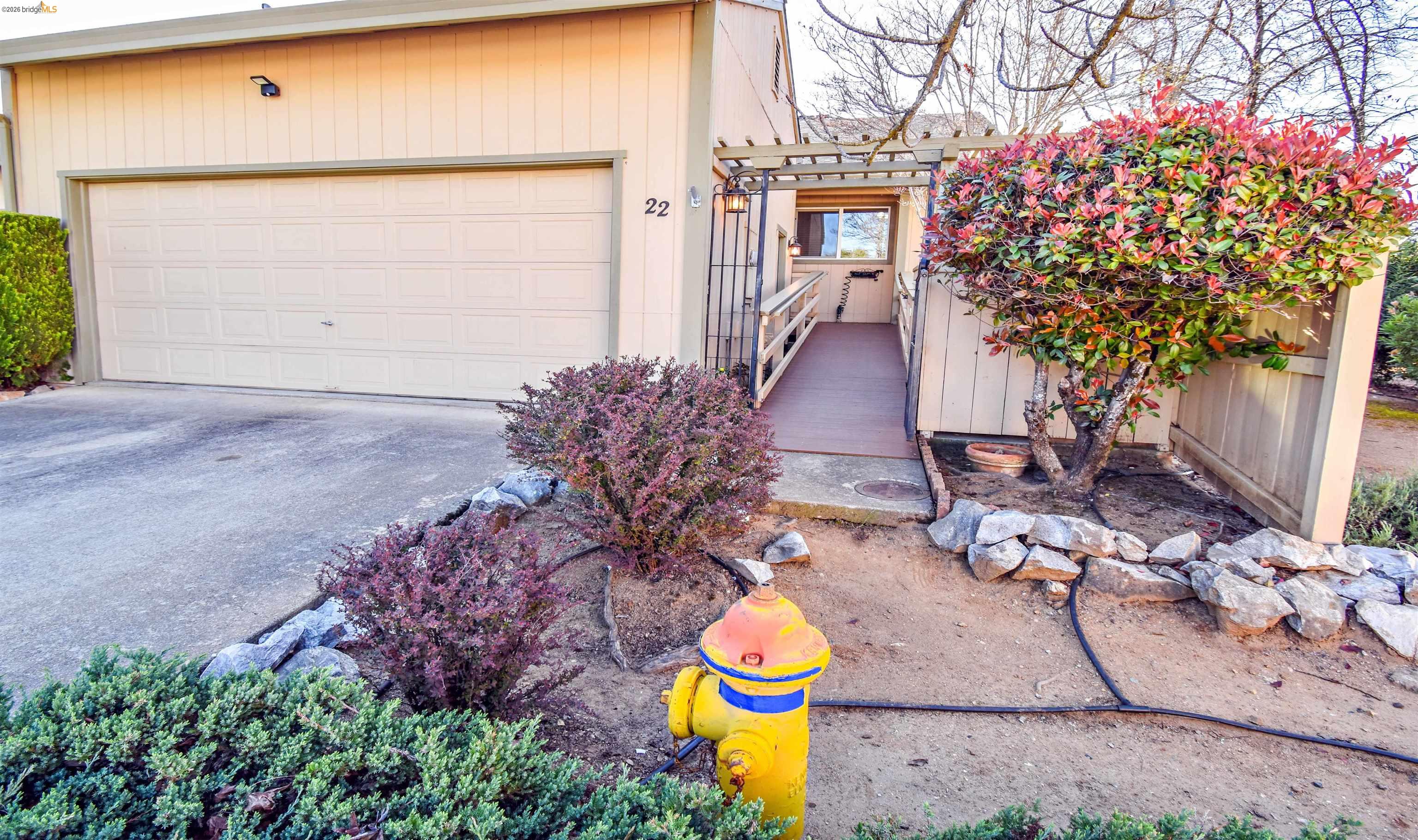 23685 Marble Quarry Road, Unit 22 Columbia, CA 95310 - Photo 1 of 33 View of front of property with concrete driveway and a garage