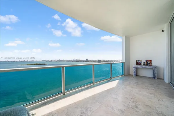 a view of a balcony with an outdoor space