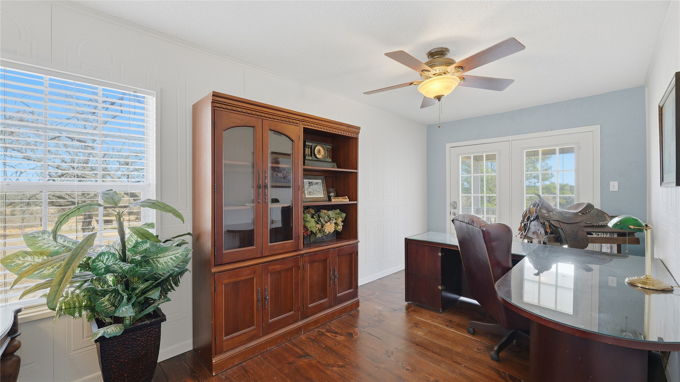 182 Little Ranch Road Red Rock, TX 78662 - Photo 29 of 40 Office space with dark wood finished floors, a ceiling fan, and french doors